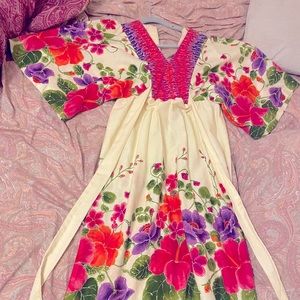 Vintage 1960s “Hilo Hattie fashion “ maxi bell sleeved dress.